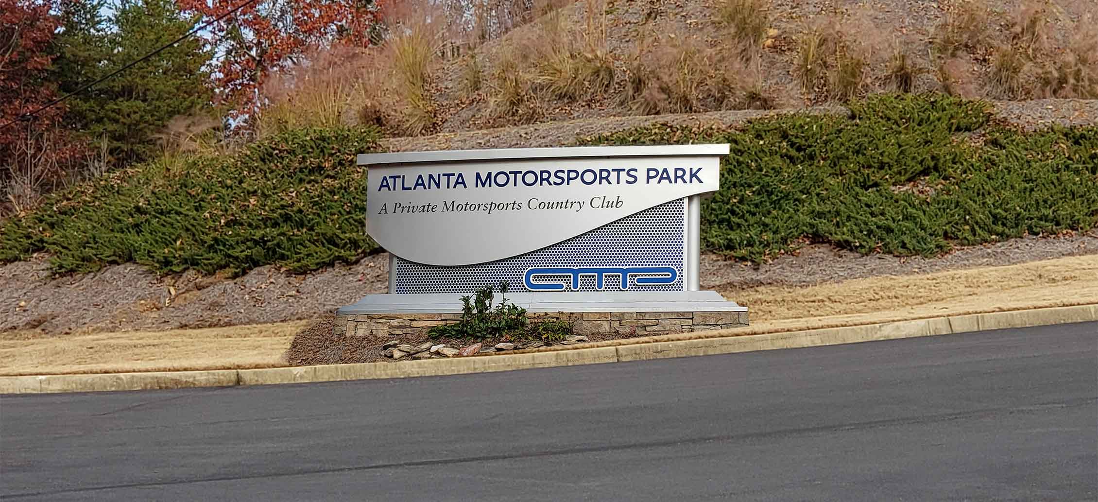 AMPFrontSignImageMod1 Atlanta Motorsports Park Noise Barrier