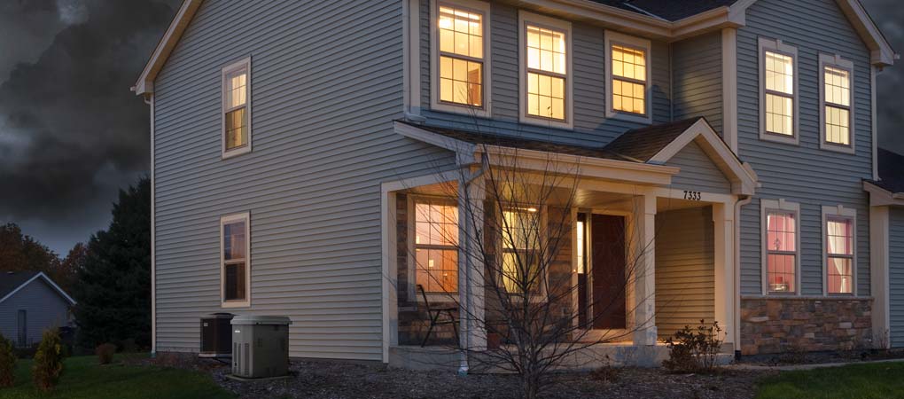house_with_generator_lights_on Residential Generators